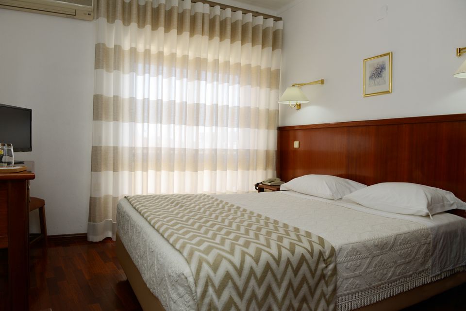 Quarto Duplo
